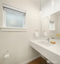 The 1/2 bath is available for guests on the main level.