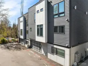 The 2 car garage offers side-by-side parking. 1 guest parking is available at the end of the street.