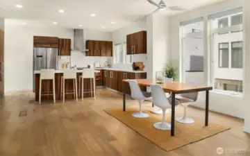 The kitchen is the heart of the home. Notice the floor-to-ceiling window!