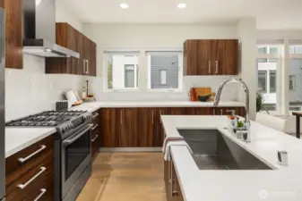 A deep sink and loads of counter space make the kitchen area functional for meal prep.