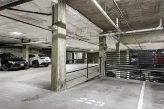dedicated parking spot with additional secure bike storage in the background