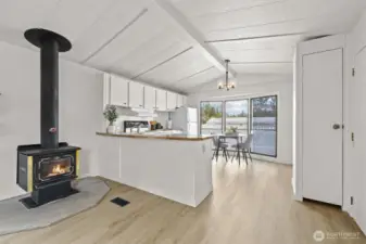 Open concept living room to kitchen offering tons of natural light.