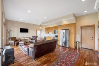 Fully permitted ADU Living room offers boasts hardwood floors, full kitchen, private entrance, 2 bedrooms and 1 bathroom.  Perfect for guests or additional income.