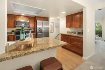 Kitchen featuring granite counters, stainless steel appliances, and plenty of cabinet space.