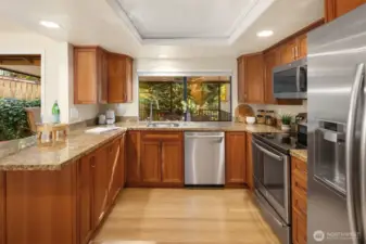 Kitchen featuring granite counters, stainless steel appliances, and plenty of cabinet space.