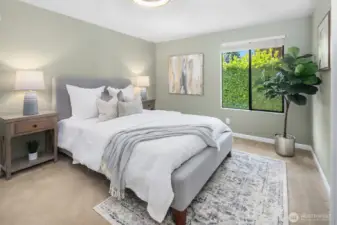 Master bedroom with remote operated low profile ceiling fan with light, French doors, large closet, and attached 3/4 bath.