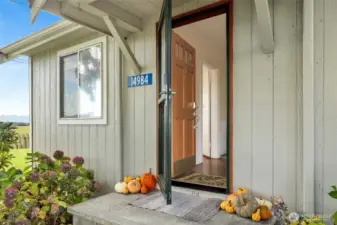 From the entryway, be greeted by modern updates and original charm