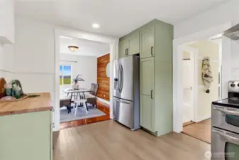 Spacious, bright, and fresh...the kitchen opens to a spacious dining room