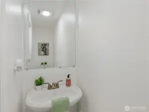 Downstairs half bathroom, great for guests