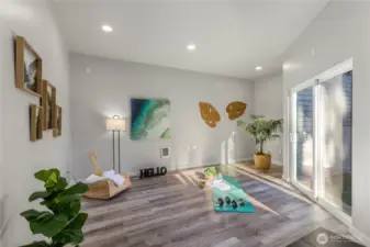 Bright and versatile detached studio with luxury vinyl flooring, recessed lighting, and sliding glass doors—perfect for a home gym, yoga retreat, or creative workspace.
