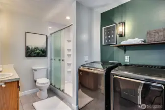 Full bath and laundry: remodeled with step-in shower, fresh paint and updated lighting.