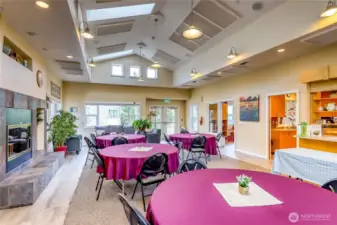 Common House with fireplace, dining hall, library, kids room and more!