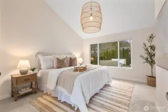 Spacious Primary Bedroom with Vaulted Ceilings