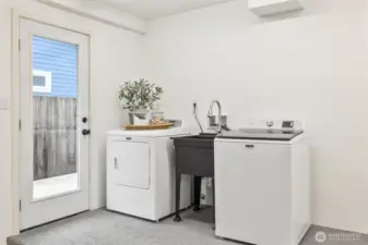 Laundry In finished garage with Brand NEW Washer/Dryer set