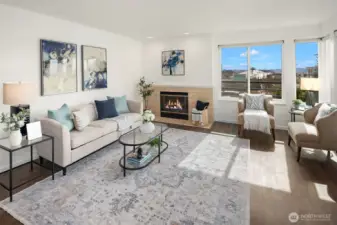 With windows on all sides, this home is full of natural light and fun views, this here is of the Climate Pledge Arena. A very quick walk!