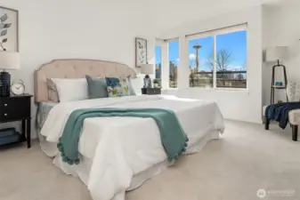Spacious primary bedroom with needle views, ensuite full bath and two large closets