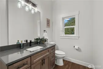 Convenient Main Floor Powder Room directly off the Mud Room Entry.