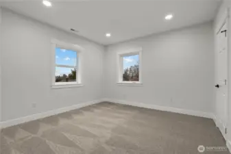 Bedroom #1 is closest to the stairs. New Carpet and Recessed Lighting!