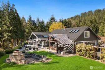 Magnificent setting includes fire pit, spa, sport court and so much more...