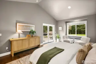 Primary Suite with access to patio and hot tub