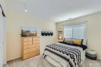 Comfortable Bedroom: Generous space with natural light and ample closet storage
