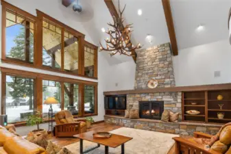 Stone fireplace with built-in cabintry