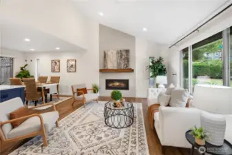 Spacious living room with gas fireplace.