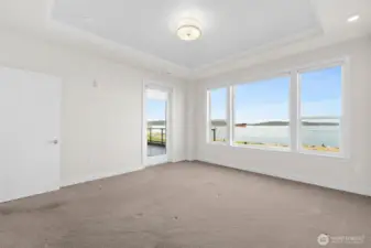 Or enjoying a morning cup of coffee right outside your primary bedroom balcony door.