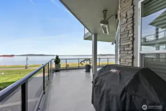 Watch the world walk by on the Pt. Ruston walking/biking trail along Commencement Bay. The trail is one mile long!  The heaters are an upgraded feature.