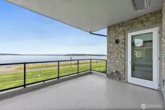 With such a dramatic view, its like every moment spent on the deck is a special one, whether you're relaxing, entertaining, or simply enjoying the changing colors of the sky at sunset or sunrise. The primary door leads out to this deck, making it even easier to step outside and enjoy all the beautiful sights.