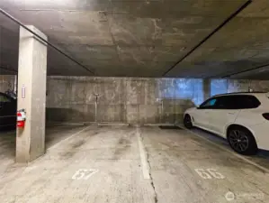 Secure parking lot with 2 designated spaces, #67 & #68