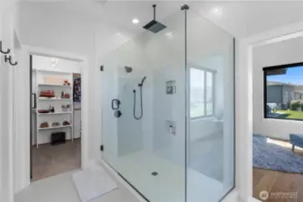 Primary shower featuring waterfall shower head.