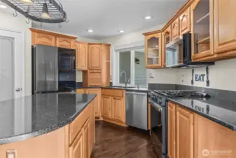 High-end stainless appliances including a gas range