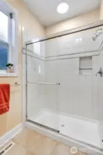 Attached 4 piece primary bathroom with walk-in shower