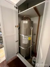 Hot water tank in hall closet