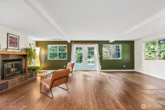 French doors in the Living Room open up to the back deck