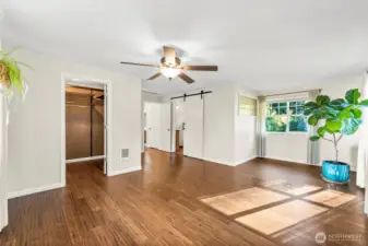 Primary bedroom with walk-in closet