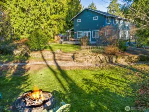 Serene backyard to enjoy an evening fire with your family and friends.