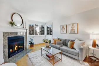 The nook under the window is the perfect sunny spot for a desk / home office.