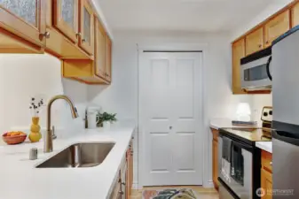 New quartz countertops provide ample space for baking projects or buffet-style hosting.