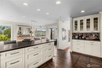 Features coffee and wine bar, pantry with pull-outs.