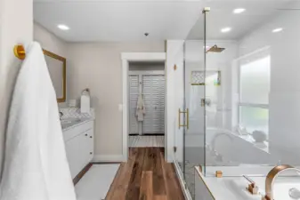 Walk-in shower and jetted tub.