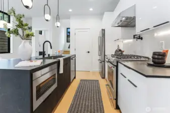 Kitchen Aid Appliance Package with Gas Cooktop, Pot Filler and Full Surround Backsplash