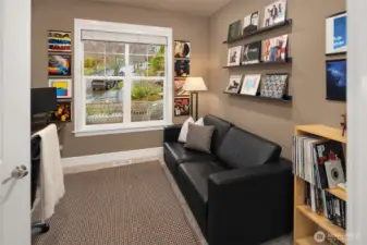 Main level Den with a closet so could double as a main level bedroom