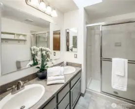 Updated primary bath with dual vanity.