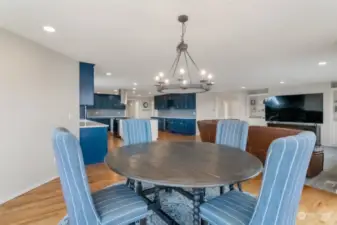 Leave the dining space into the spacious open area leading into the large kitchen! The family room also includes great built ins with plenty of storage and room for decor!