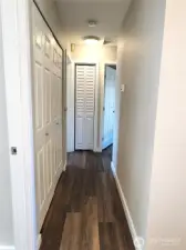 Hallway with convenient laundry closet