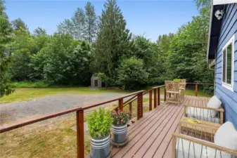 Durable Trex Deck is perfect for Pacific Northwest entertaining View off of rear deck This photo is virtually staged