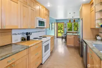 Light and bright kitchen with eating nook.