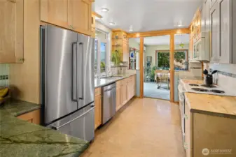 Kitchen located in between the dining area and eating nook.